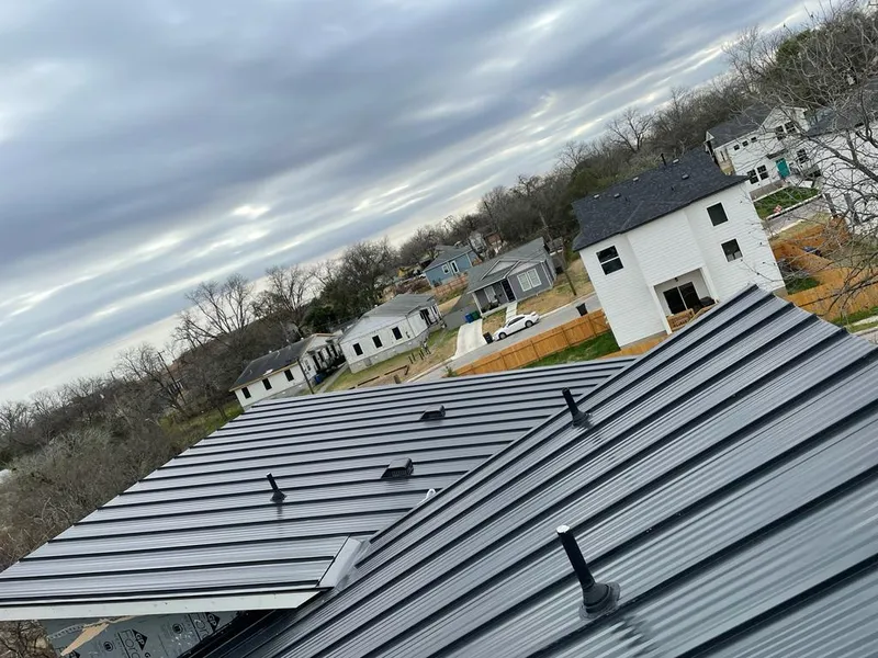 Standing seam metal roof panels with vents for Skylight Repair in Aurora